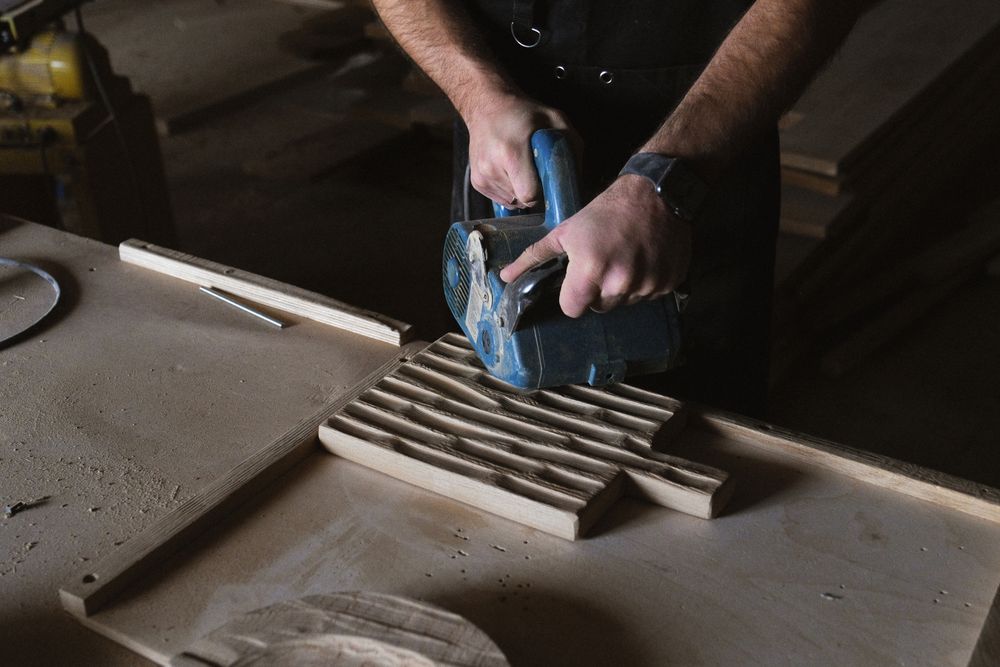 Milling a replacement board on a bench to match an existing floor profile.